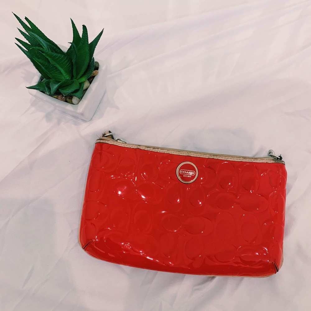red coach handbag.